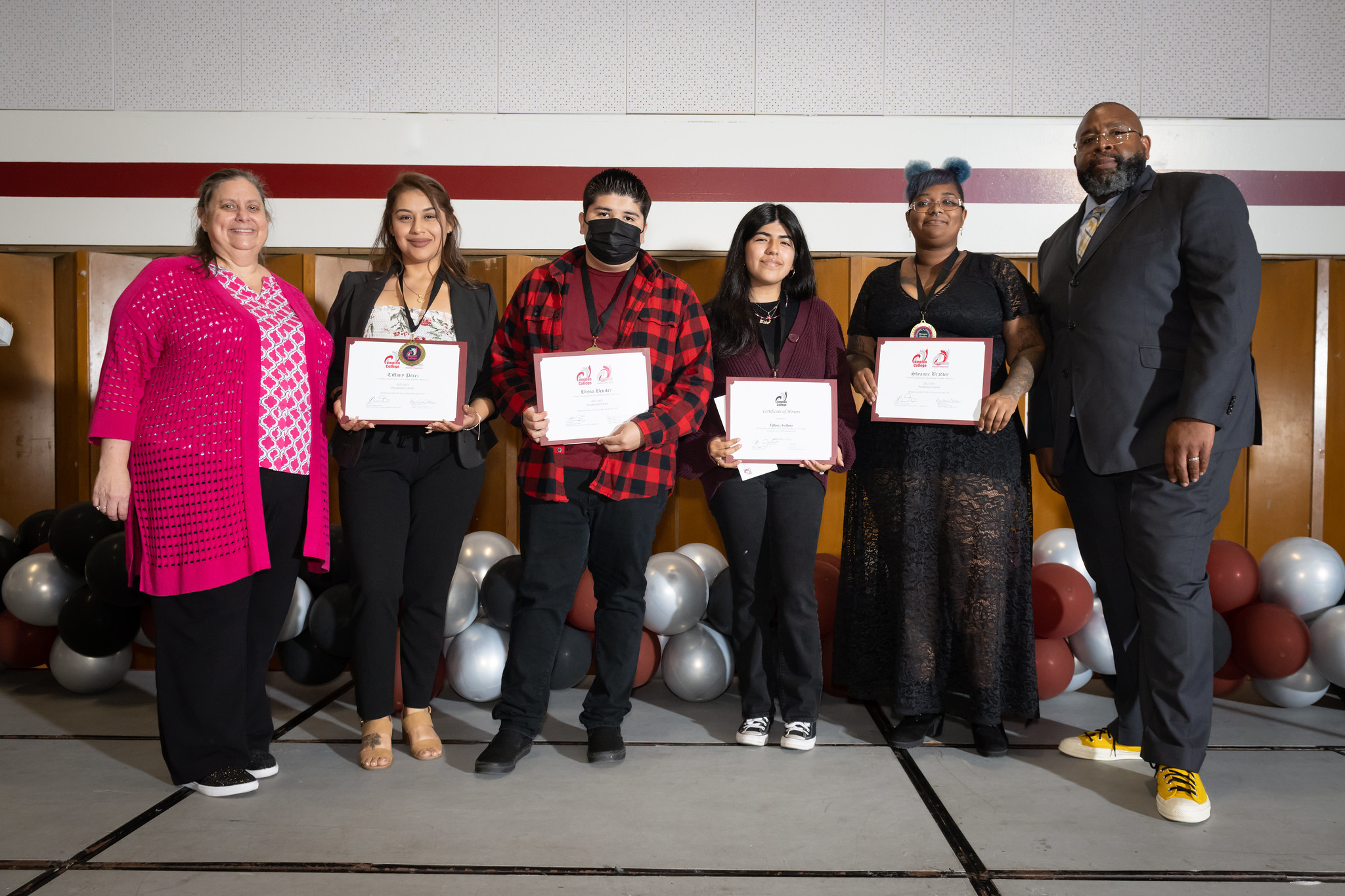 Compton College’s 2023 Presidential Scholars were awarded their certificates of Outstanding Academic Merit at the annual Academic Awards and Scholarship Ceremony. Pictured, left to right, Vice President of Academic Affairs Dr. Sheri Berger, Presidential Scholars Tiffany Perez, Bryan Benitez, Tiffany Arellano, Shyanne Bradley, and President/CEO Dr. Keith Curry.